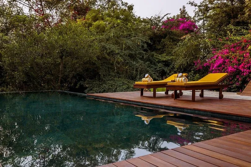 Peacocks are often spotted strolling by the pool at Anvaya 