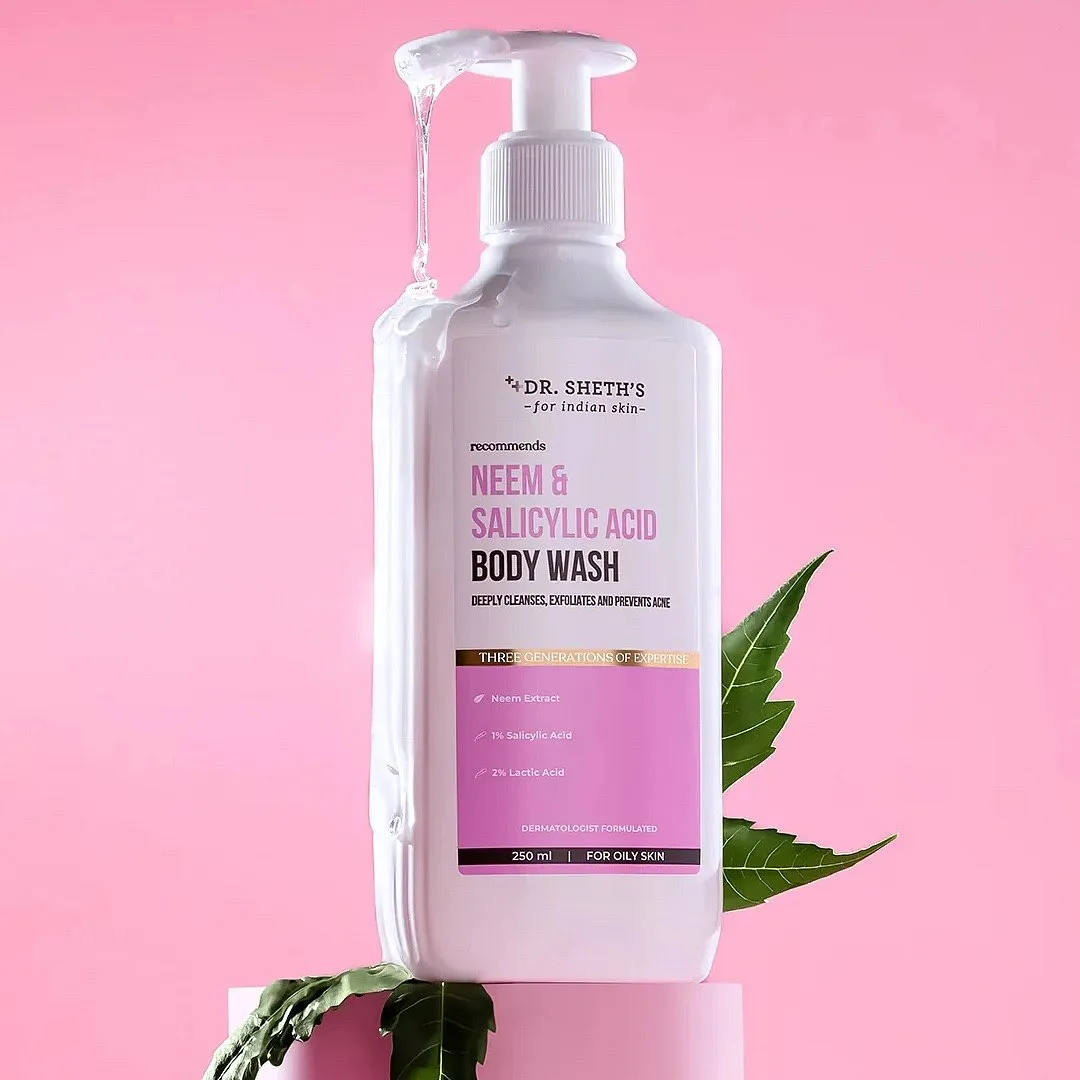 Neem & Salicylic Acid Body Wash, Dr Sheth’sIt’s always a good idea to make space for efficiency starting from the very first step of your skincare routine—regular body washes, therefore, might not make the cut. Give this body wash from Dr Sheth’s a shot for it combines the antibacterial and anti-inflammatory benefits of neem and salicylic acid, a BHA, to bestow clear, healed, healthy and purified skin. While both the ingredients do a great job at addressing acne-causing germs, neem promotes detoxification while salicylic acid exfoliates the skin and reduces the presence of comedones all over. Plus, it also contains lactic acid, an AHA, that resurfaces the skin and supports the exfoliative function of the BHA.Priced at ₹349Shop hereImage: www.drsheths.com 