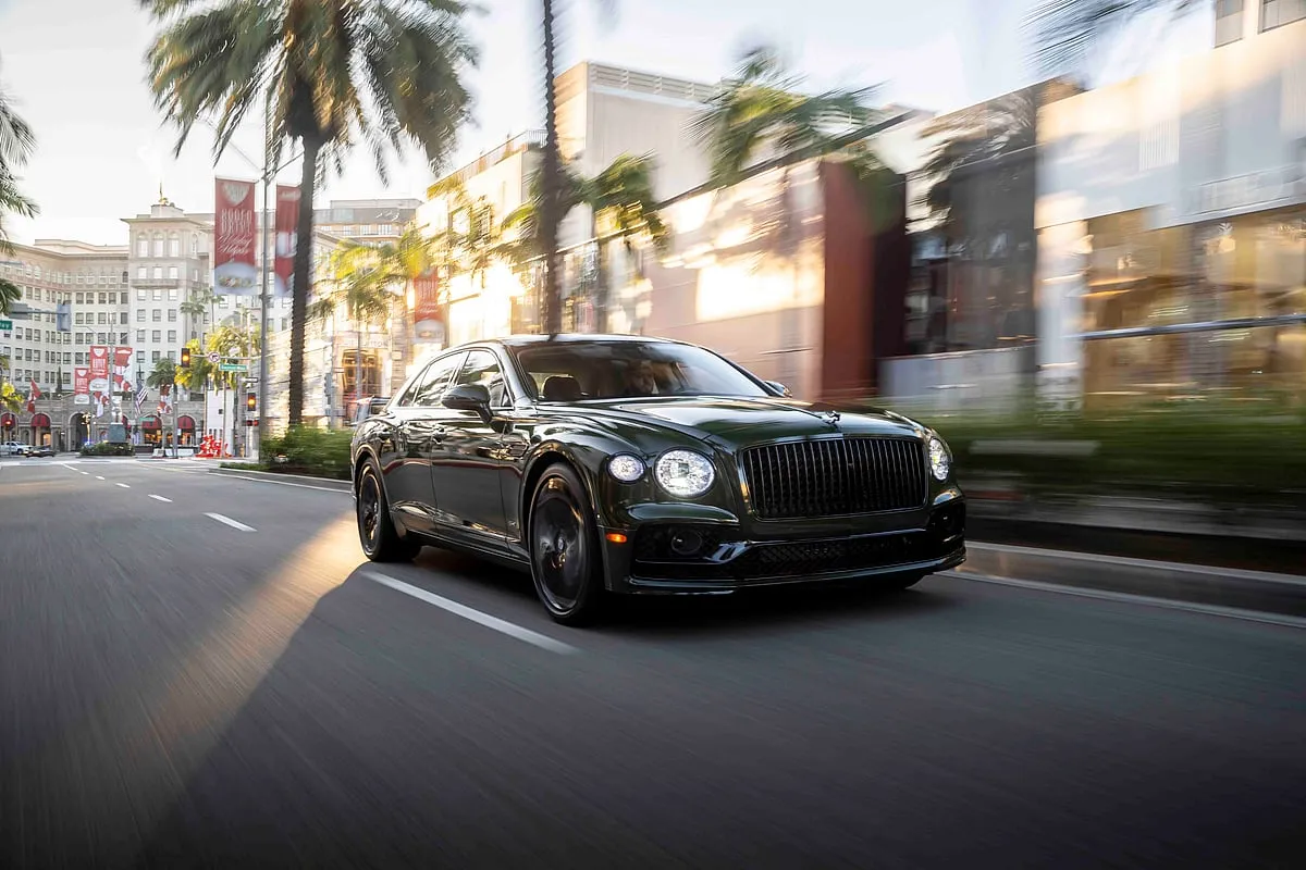 Bentley Flying Spur HybridThe Bentley Flying Spur Hybrid is a sophisticated stride into a greener future, seamlessly bringing luxury and sustainability together. With its electric-only  range of up to 41 km, it extends an invitation to experience the future of eco-conscious  luxury travel. Externally, it's a vibrant palette of possibilities, with 60 colour options,  including the classy Blackline specification, subtly distinguished by a 'hybrid' badge. Inside, the customisation continues with 15 opulent upholstery colours and eight veneer options. Under the hood, it harmoniously unites a 2.9-litre, twin-turbo V6 engine with an electric motor, delivering 544 hp and 750 Nm, with an impressive  0-100 kph sprint in just 4.3 seconds. Bentley envisions a comprehensive eco-friendly lineup by 2024, with an all-electric model by 2025 and a complete transformation to an EV  portfolio by 2030. In this hybrid model, Bentley assures that environmental consciousness and  unparalleled luxury are not mutually exclusive.Price: ₹5.25 crore onwards 