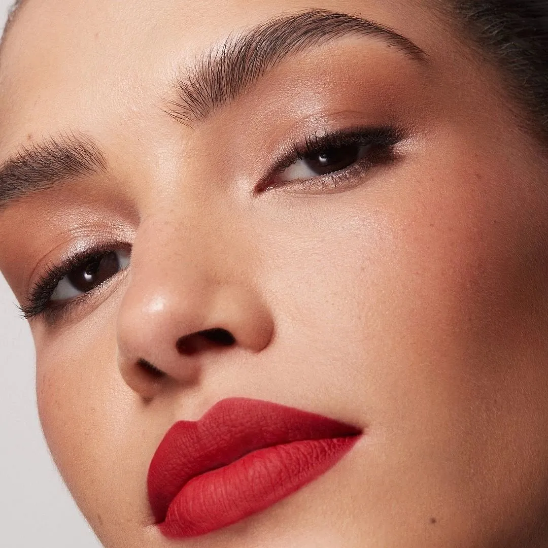 Velvet Matte Lip Pencil – Dragon Girl, NARSFrom Taylor Swift to Sonam Kapoor, many occasional bold-lip wearers swear by this warm-toned red from NARS, given that it is poppy enough to create an impact without looking too bright. The matte lip crayon promises easy application, and re-application, while the fats and vitamin E in the formula make sure crusty lips stay at bay. Unlike Ruby Woo, this colour might not look the exact same on every skin tone, nonetheless, it makes for a great warm orange-pink-red hybrid for brown skin.Priced at ₹2,800 approximatelyAvailable at StyleDotty.in 