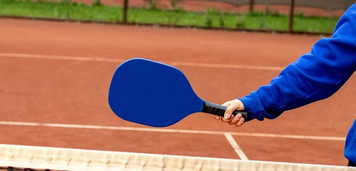 The sport has enthusiasts from ages eight to 80 flexing it out on courts for recreational, fitness and competitive purposes. Image: Unsplash 