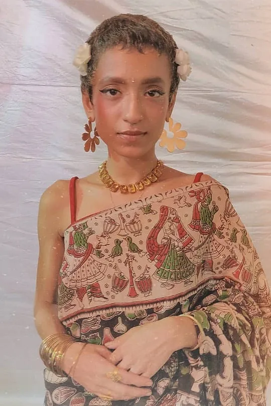 “I gravitate towards the more classic saree drapes, but I will occasionally pair them with crochet bikini tops or any fun crop tops I may have,