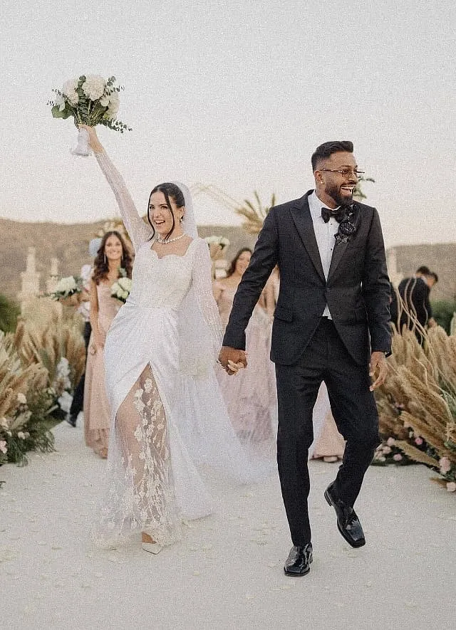 The idea of a wedding as a public spectacle isn't new. Historically, weddings were meant to forge unity among communities. Image: www.theweddingstory.com 