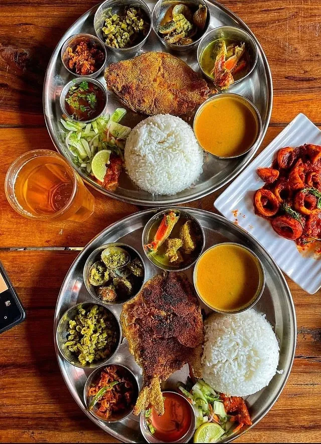 At Vinayak in Goa the seafood thali and prawn masala fry are perennial favourites—despite a minimum wait time of 30 minutes for tables 