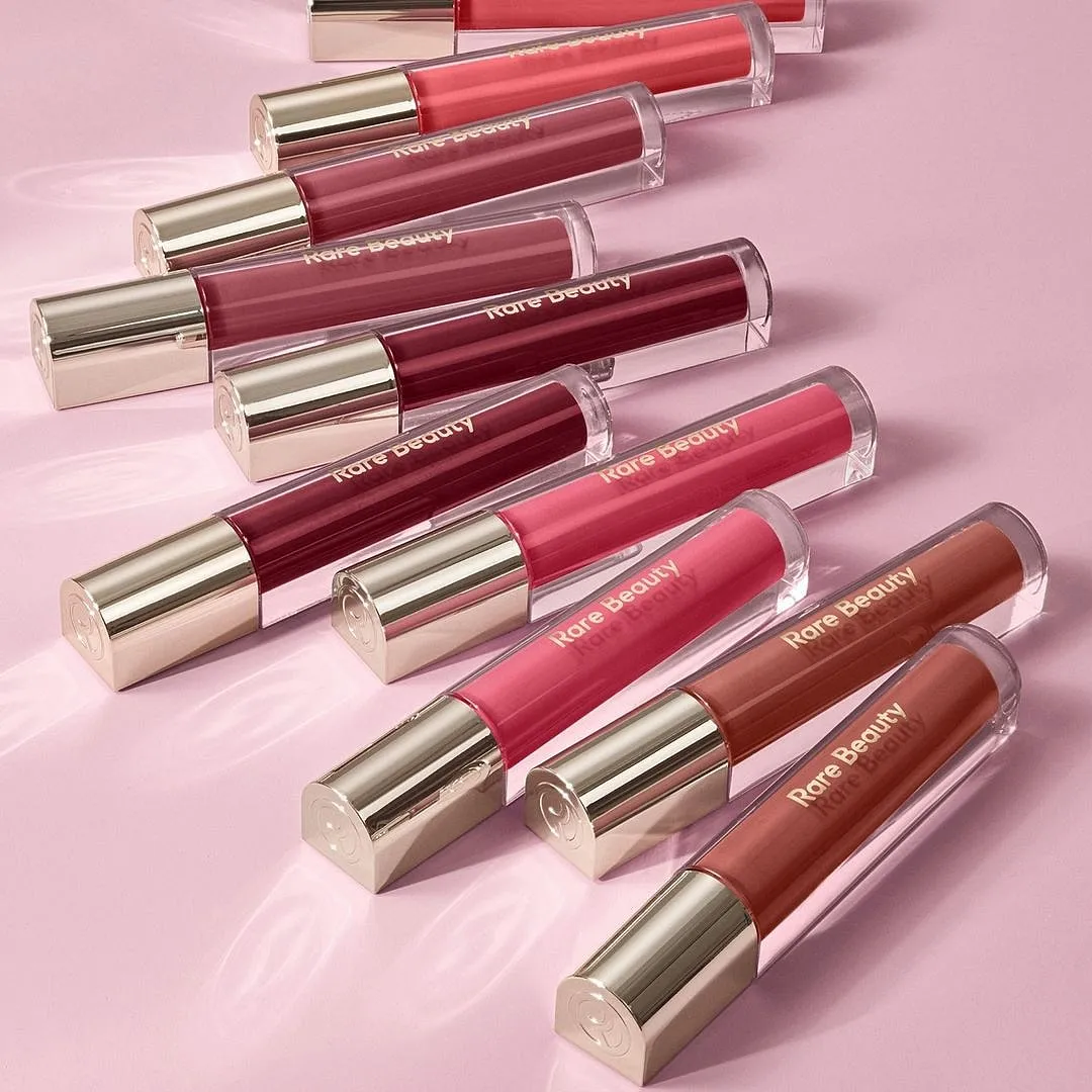Stay Vulnerable Glossy Lip Balm, Rare BeautyA user-friendly doe-foot application and a non-sticky texture give this tinted lip balm an edge. Available in five brown skin-friendly colours, these tinted lip balms deliver optimal hydration, leaving the lips cushiony-soft for a couple of hours. Alongside a high colour pay-off, these glossy lip balms also contain sunflower seed oil, salicylic acid, along with a blend of gardenia, white water lily, and lotus extracts. Image: Instagram.com/rarebeauty 