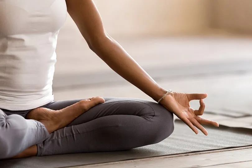 The Lotus Pose is also known as the pretzel, as you will have to bend your legs over each other while sitting. Image: Pexels 