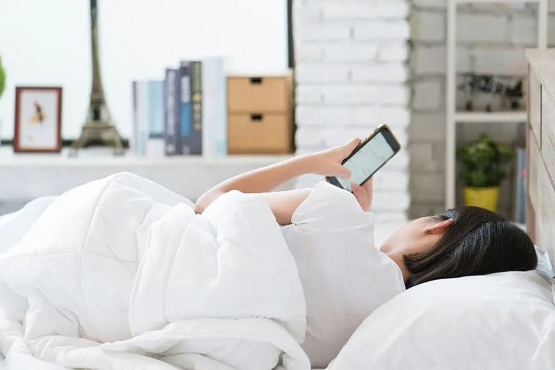 Consider doing your nighttime skincare routine after you are done with your bedtime scrolling so that germs do not transfer to your face right after you have cleansed and moisturised it. Image: Getty Images 