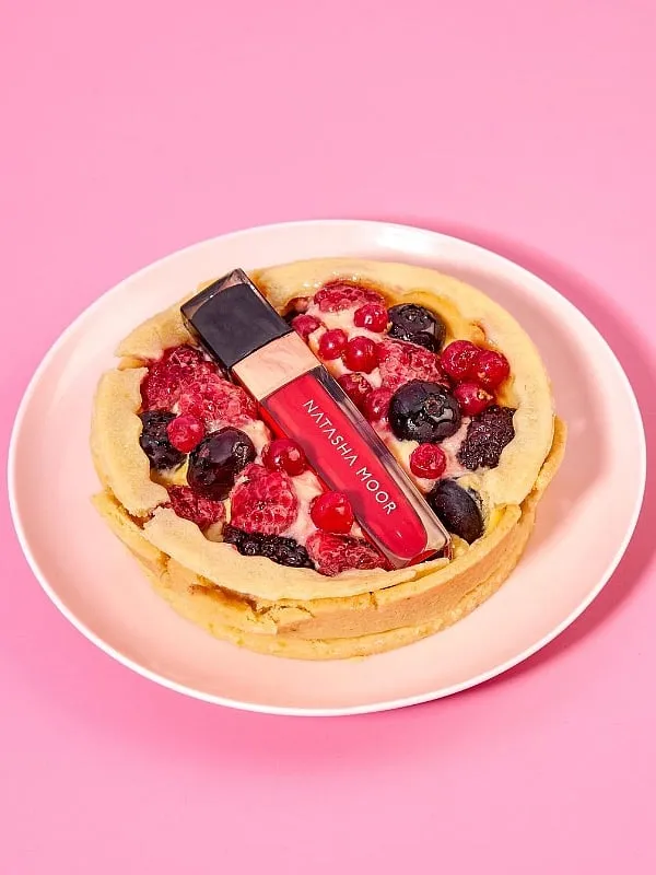 Natasha Moor and Flavia Giuliodori swear by bold lips to make a festive statement. Image: Instagram.com/natashamoorcosmetics 