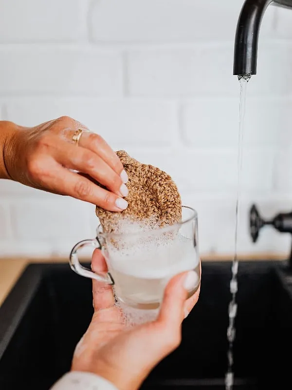 Day-to-day activities at home such as cleaning utensils can weaken your nails. Image: Pexels 