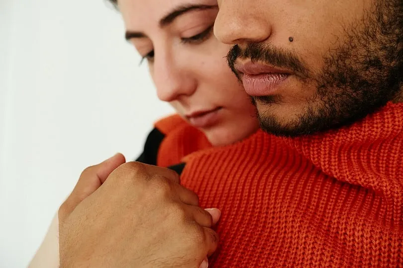 Intimacy is often one of the first aspects to fade, with couples reporting months—even years—of emotional or physical distance. Image: Unsplash 