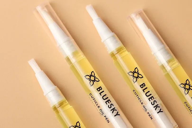 This nail oil one by Bluesky contains coconut oil, jojoba oil, and sweet almond oil. Image: blueskycolors.com 
