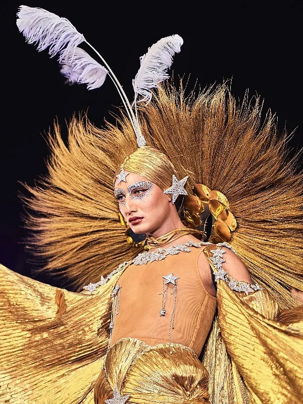 A still from the runway show featuring  Glorious Luna  