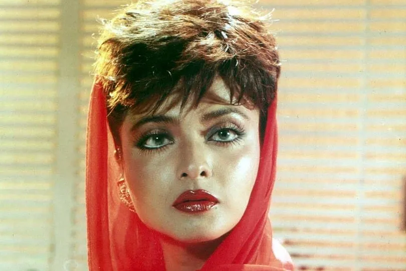 Rekha’s character in Khoon Bhari Maang (1988), returns to seek revenge after she is pushed by her husband into a crocodile-infested lake, and falsely declared dead. The persona Rekha brings is still “peak campy” in Indian cinema. Image: IMDB  
