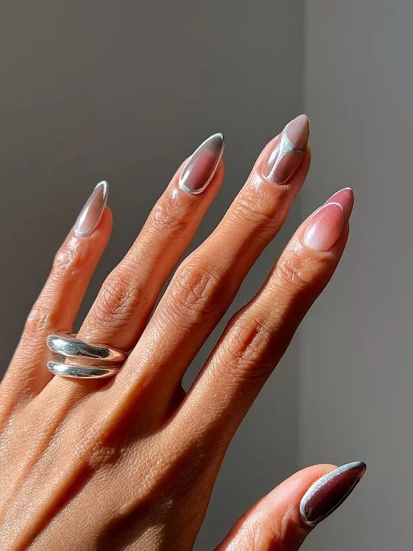 Clean, negative space lines let the natural nail peek through. Image: Instagram.com/overglowedit 