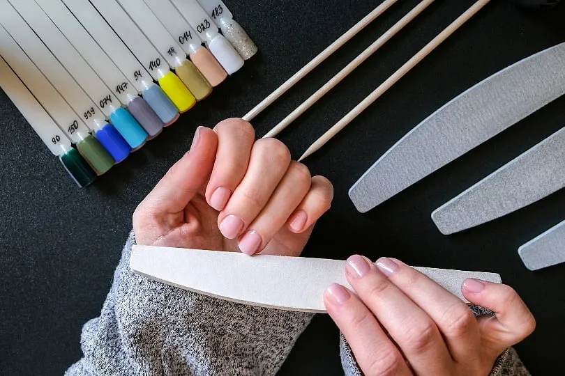 Trimming and shaping your nails correctly can prevent splitting and promote healthier growth. Images: Unsplash 