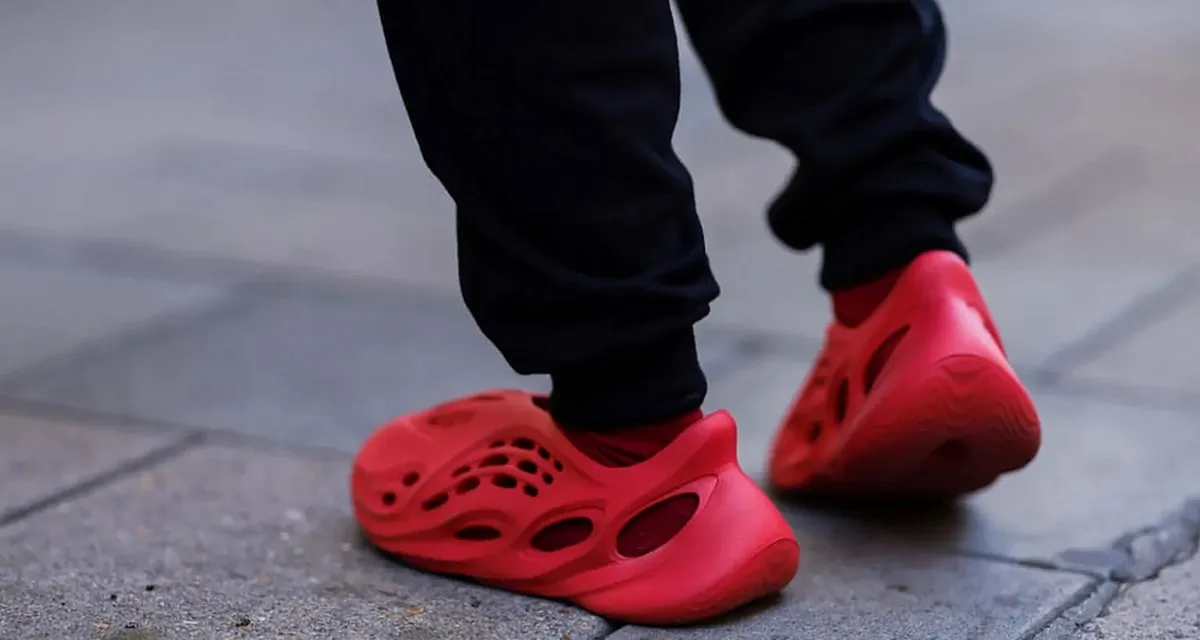 Kanye West's Yeezy line with Adidas, while not strictly retro, borrows heavily from nostalgic sneaker silhouettes, blending timeless elements with his visionary designs. Image: Adidas_www.bbc.com 