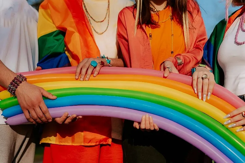The shift from secrecy to safety doesn’t happen overnight; it begins with small acts of self-trust. Seeking support—through chosen family, therapy, or queer community—can be the first step toward breaking old patterns. Image: Unsplash 