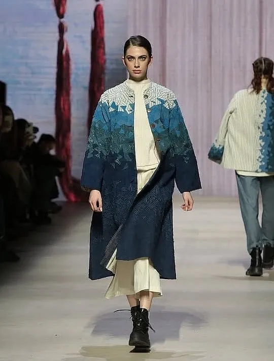 CoEK presented a collection at the Moscow Fashion Week (13-18 March 2025), featuring colourful, layered dresses, separates, and accessories 