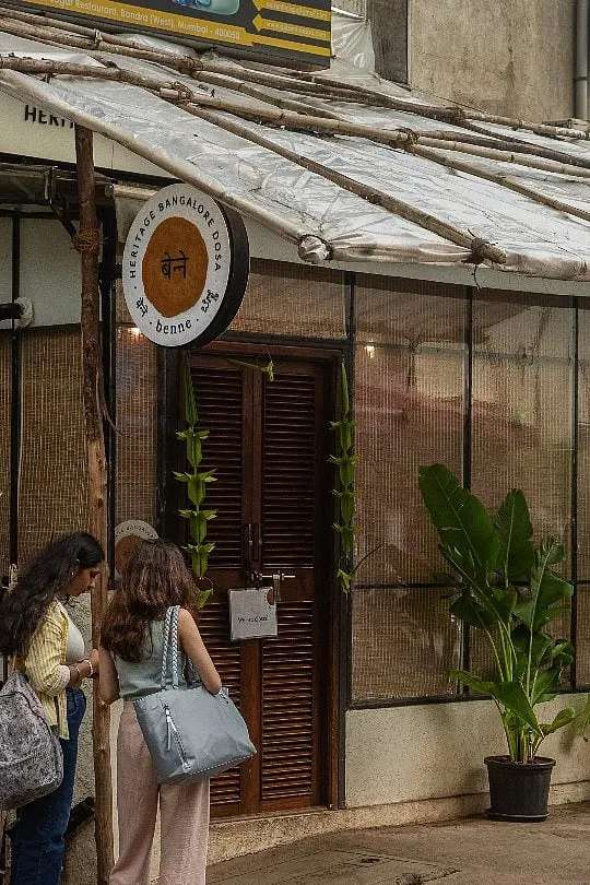Benne, a standing-only (15-18 people), self-service restaurant that serves traditional Bengaluru Benne dosa opened in Bandra, Mumbai, in 2024 to serpentine queues. Within a year, they've opened a 60-seater in Juhu   