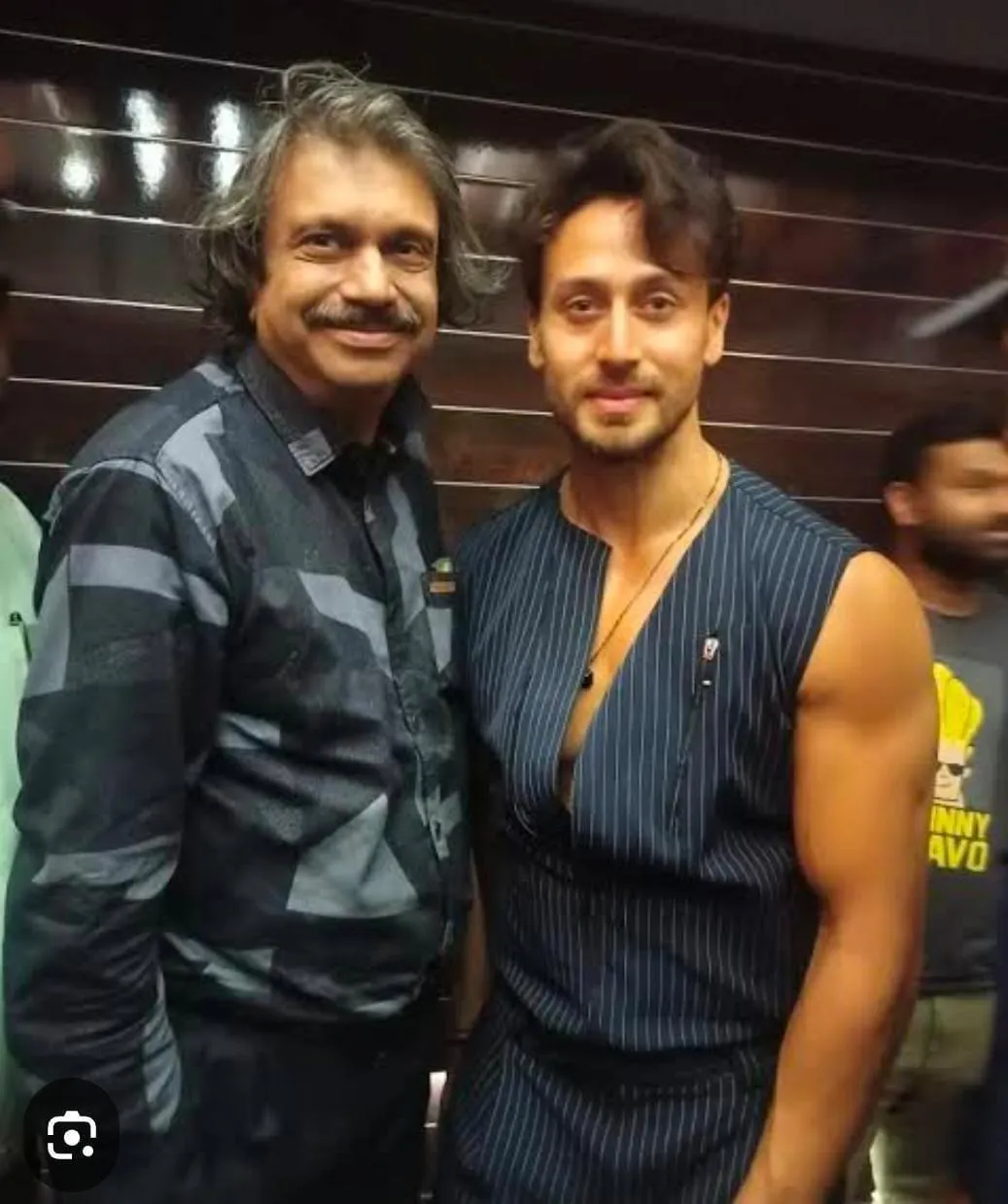 Tiger Shroff ( right)  with sr journalist Chaitanya Padukone