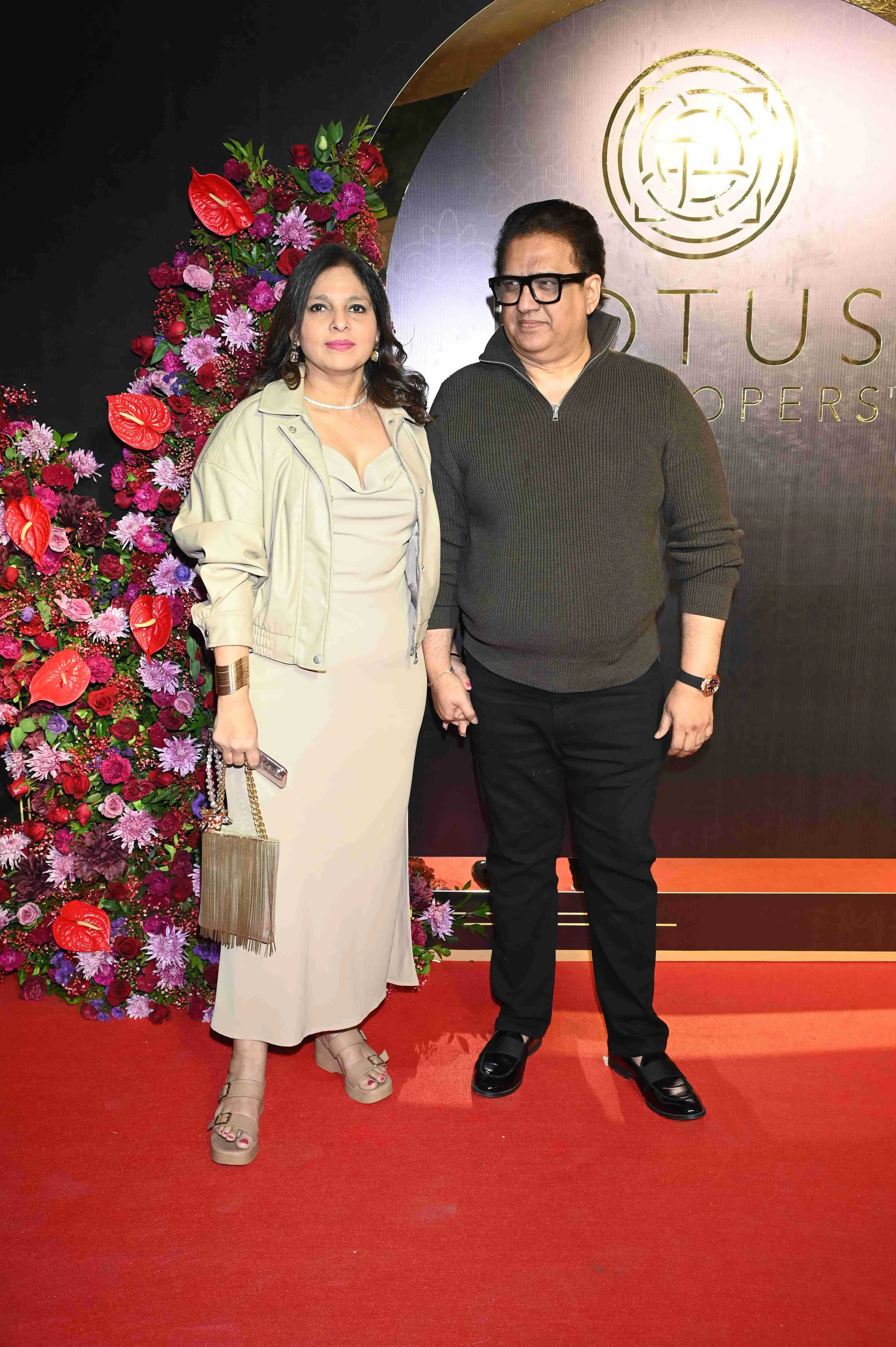 Daboo Mallik with wife joins producer Anand Pandit at his recently renovated Juhu residence, where he hosted an intimate gathering to mark his 62nd birthday on December 21