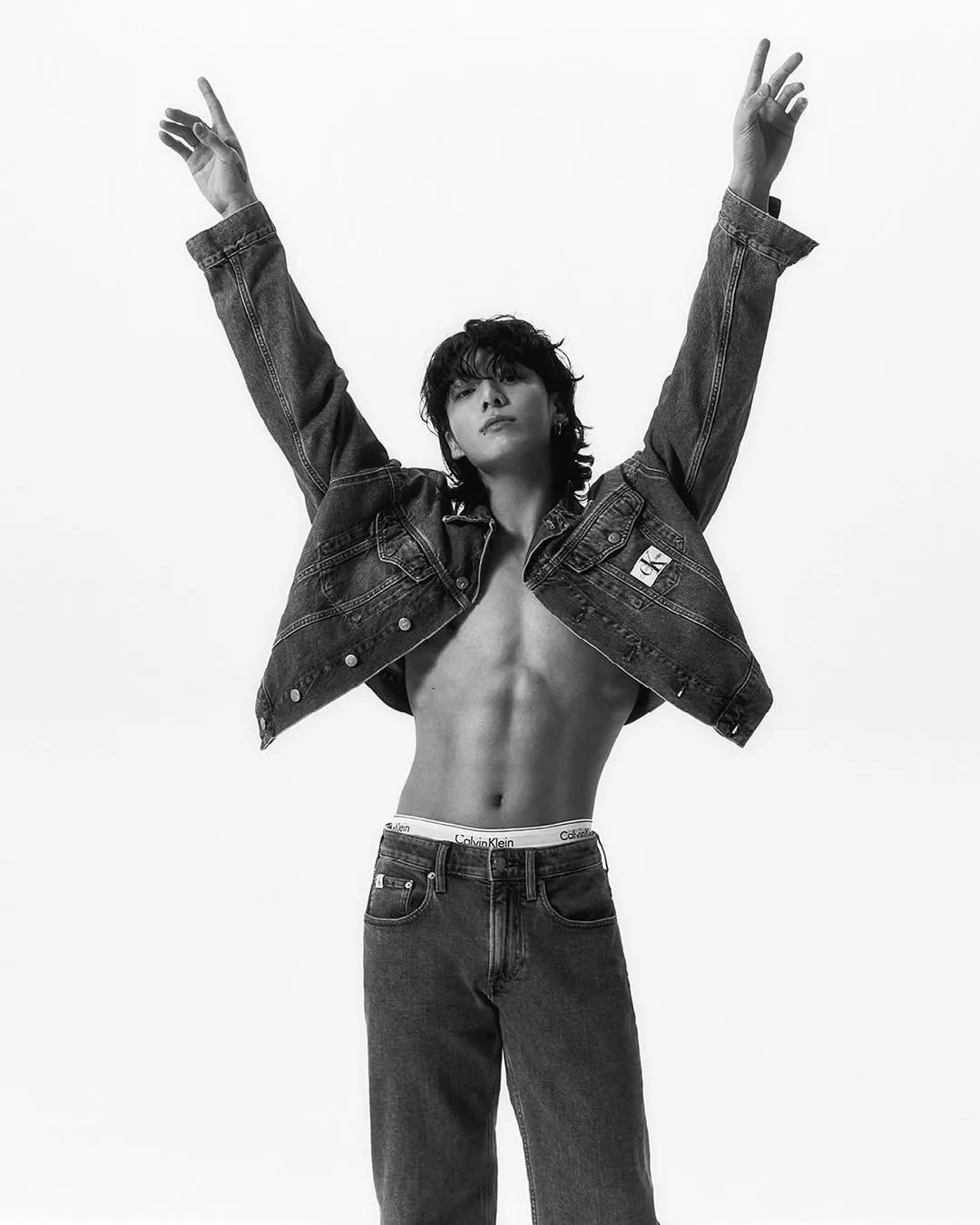 Introducing Jung Kook. The global icon in iconic denim. By @parkjongha.