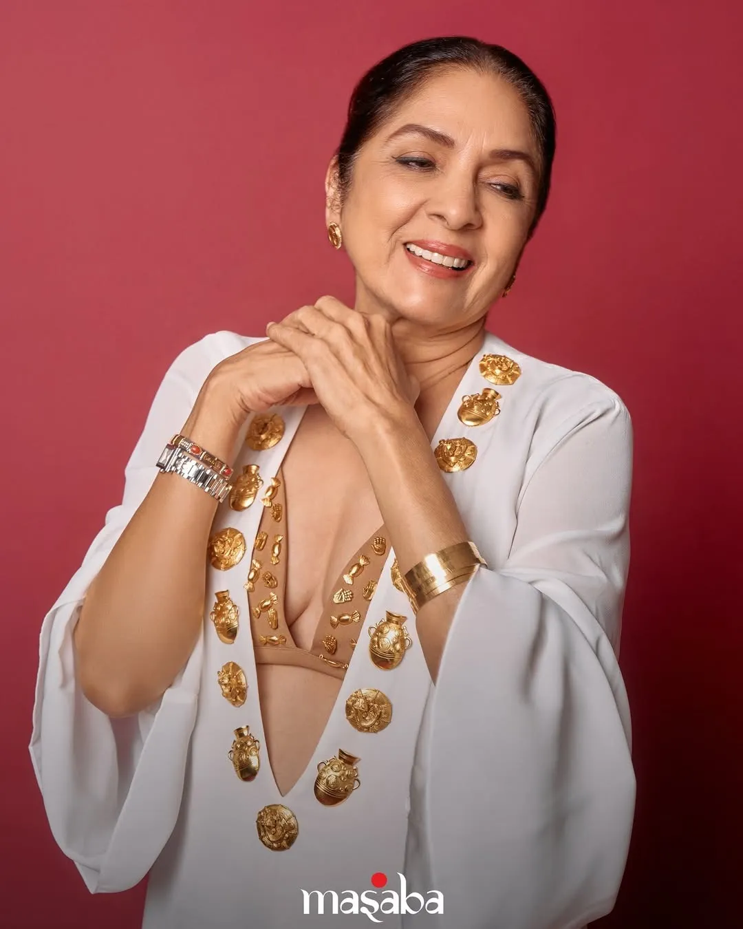 @neena_gupta in the ‘Rann Kaftan’ and the ‘Biscuit Bra’ with house charms. The look is completed