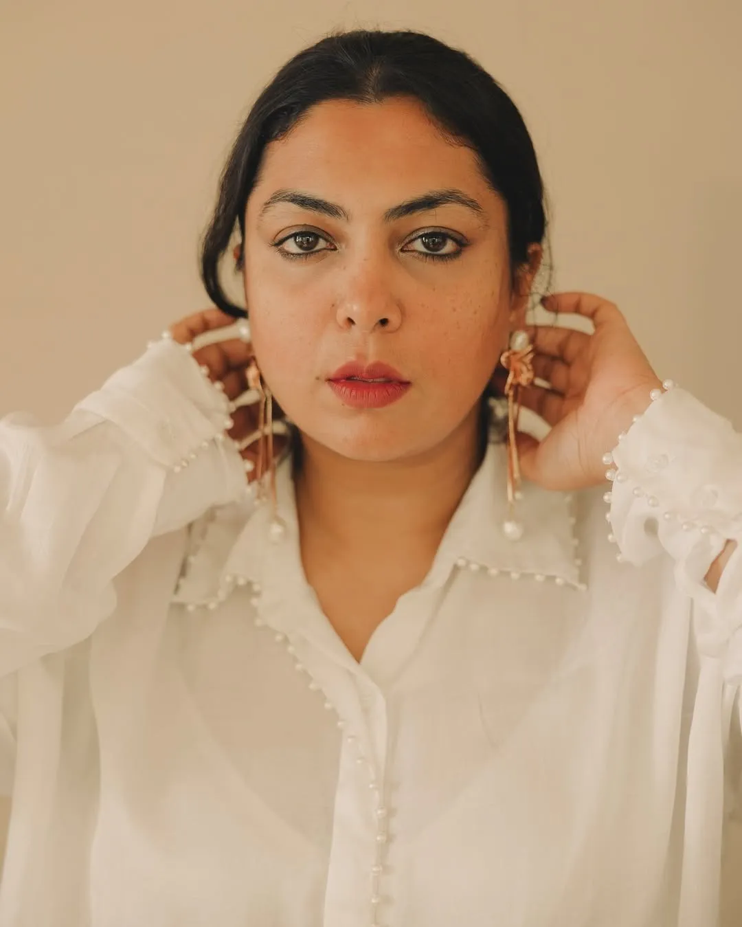 Minimalism with statement jewellery  @valliyan mini orchids in rose gold & pearlPhoto by @fourfo