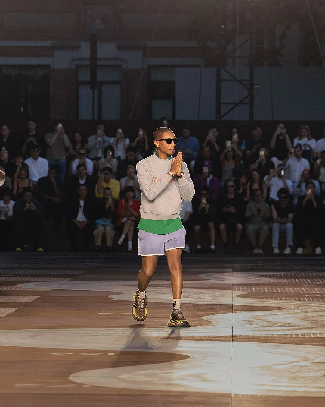 Men’s Spring-Summer 2026 Show. Positioned within the magnified game board, @pharrell closes the