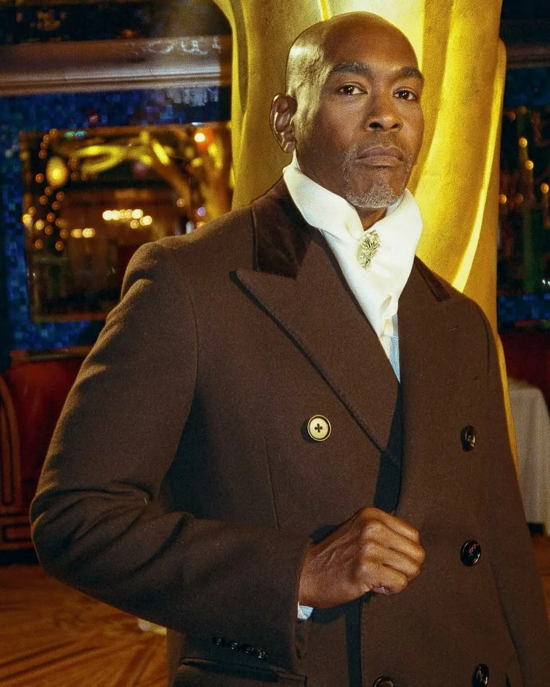 Oscar-winning costume designer #PaulTazewell wears a brown cashmere topcoat from Fall-Holiday 20