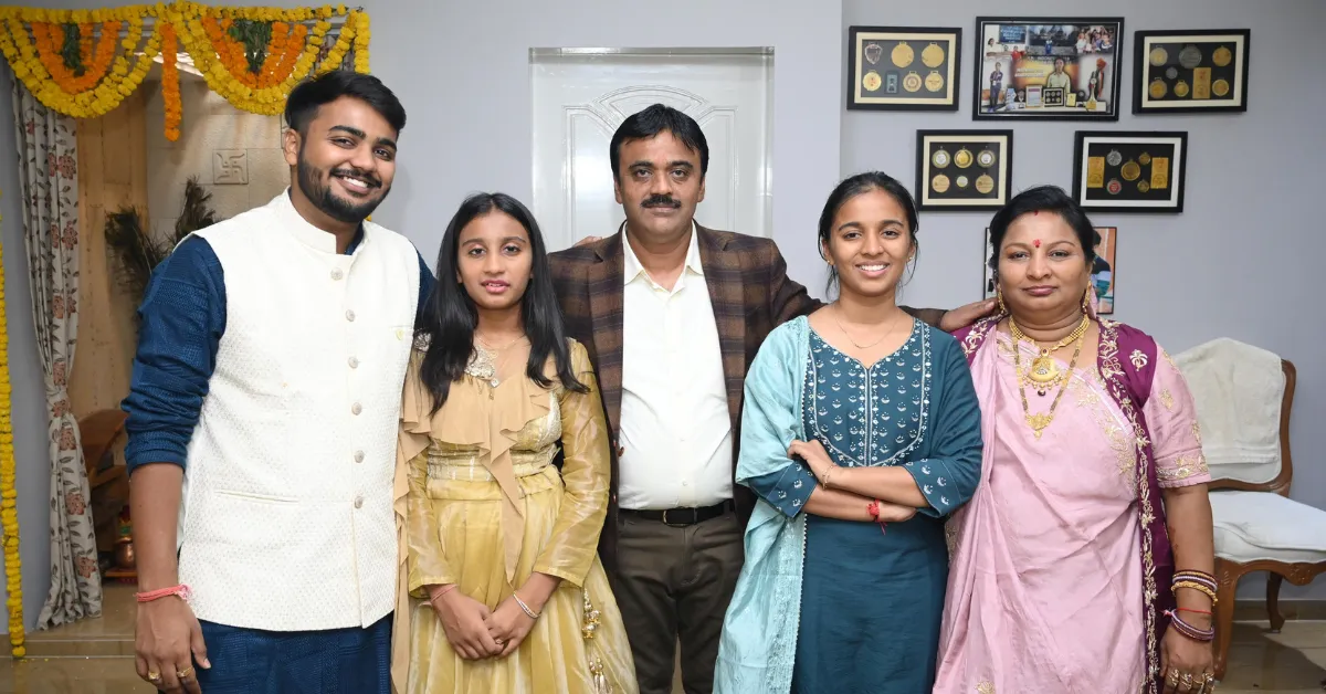 With her parents and sister Urvi at home in Ahmedabad — the family whose support powers every move she makes.