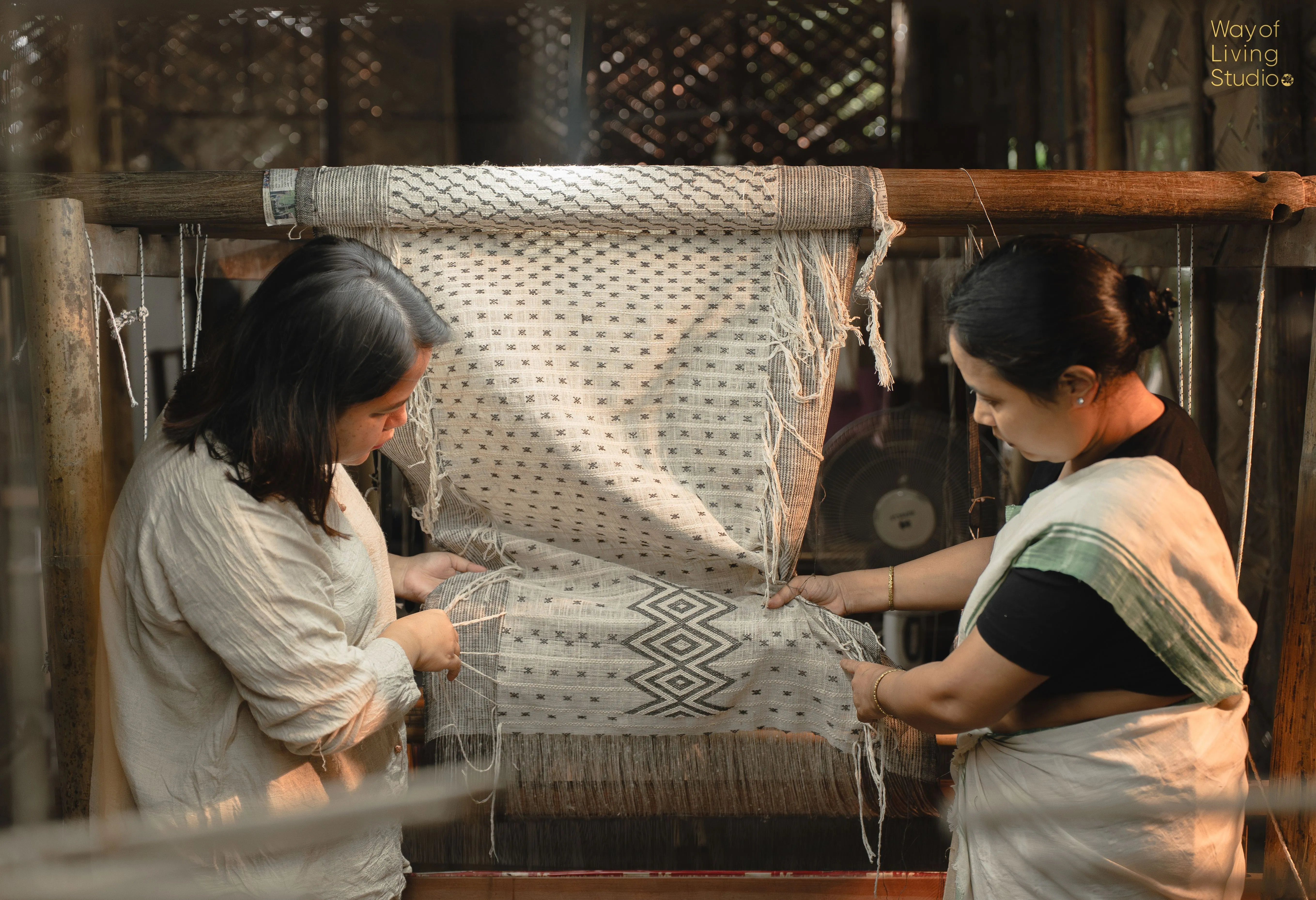 Artisan weaver Baby Dutta and Jagrity at one of their indigenous Eri silk looms at the Studio.