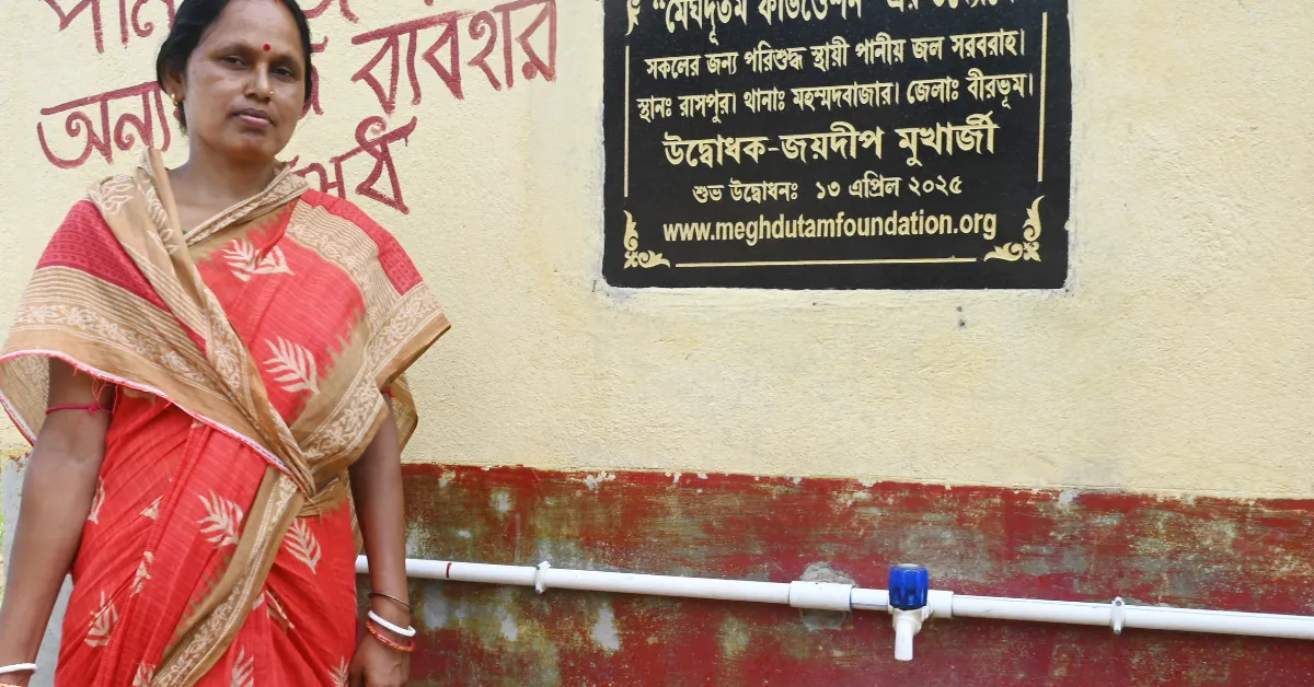 Champa Saha recalls years of relying on iron- and arsenic-laced tube-well water before the new plant changed life in Raspur.
