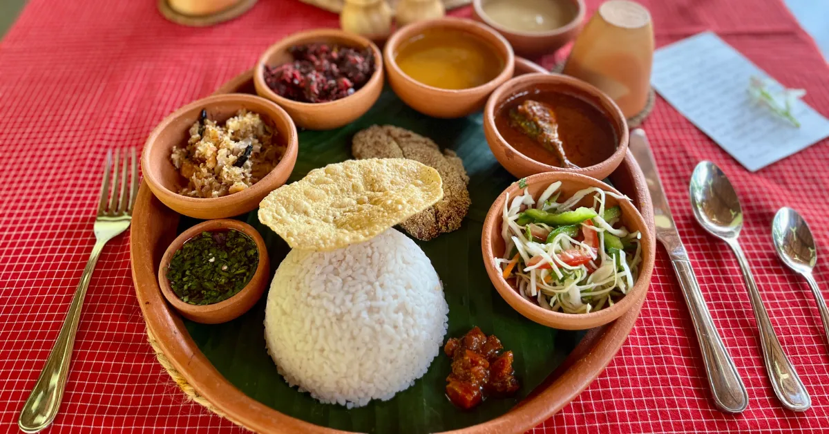 Lunch is served as a traditional Goan thali, where food carries memory, routine, and a sense of place.
