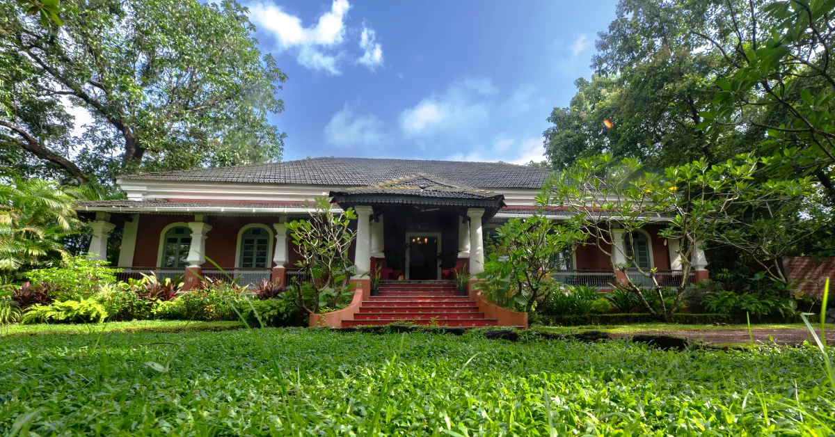 The scale and siting of the house reflect an era when homes were built to belong to their surroundings.