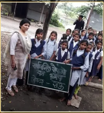 Maya Kaul with school children.