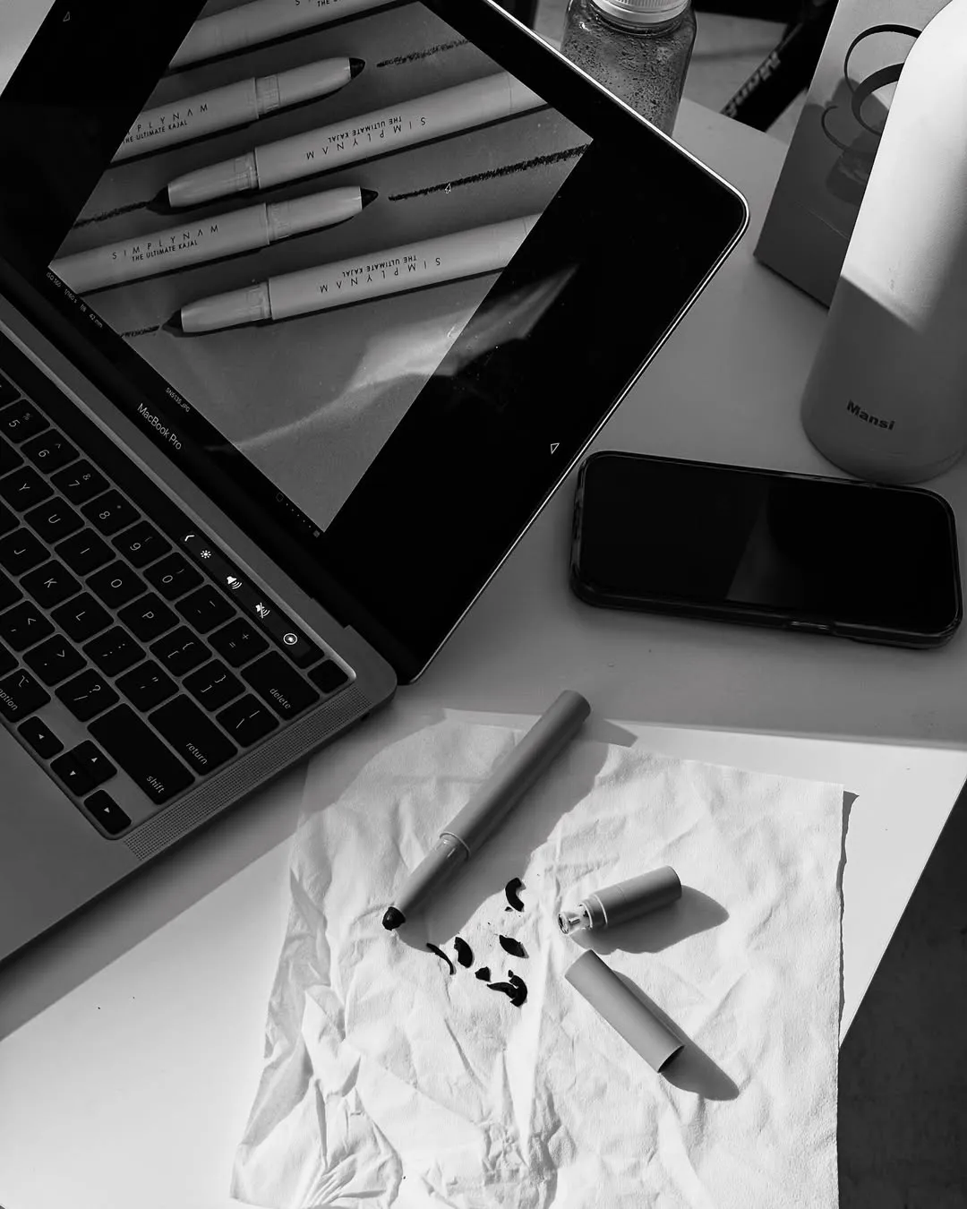 A black and white picture of kajal pencils from Simply Nam