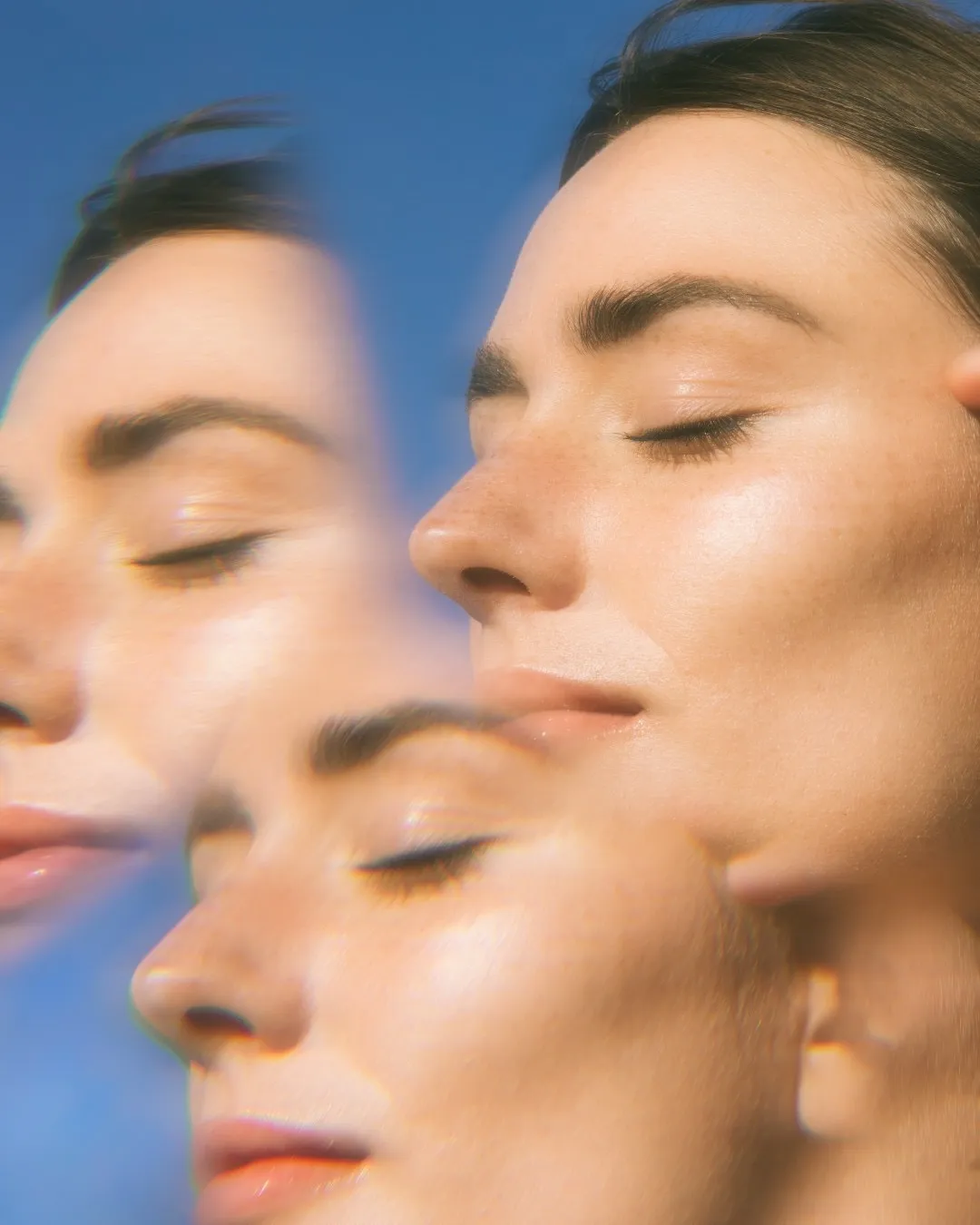 A woman's face in the sunlight with sunscreen on for optimal sun protection