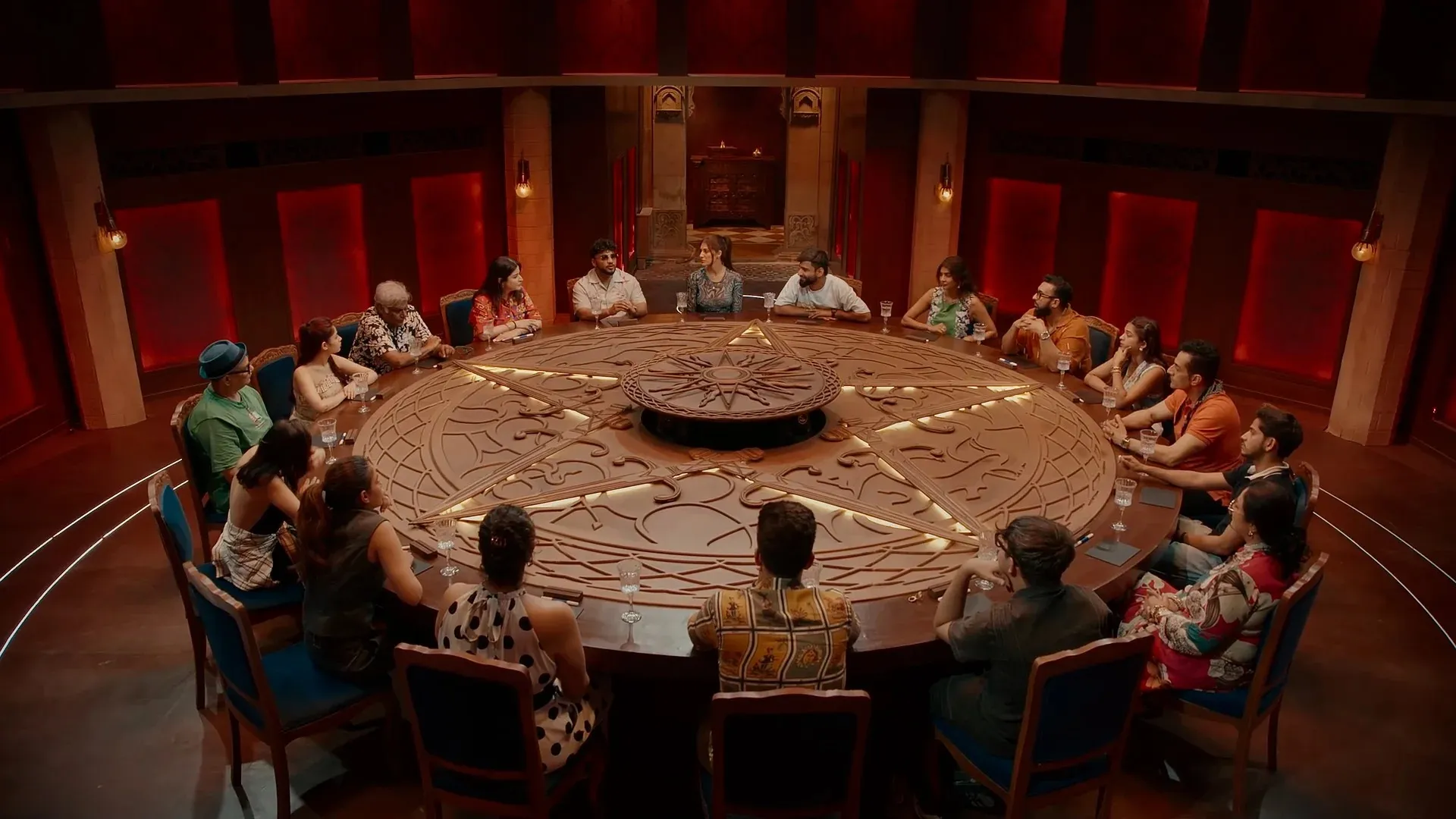 Participants of The Traitors, one of the most recent Indian reality shows gather around a table and play the game, thriving in the current reality TV culture thanks to OTT reality shows India