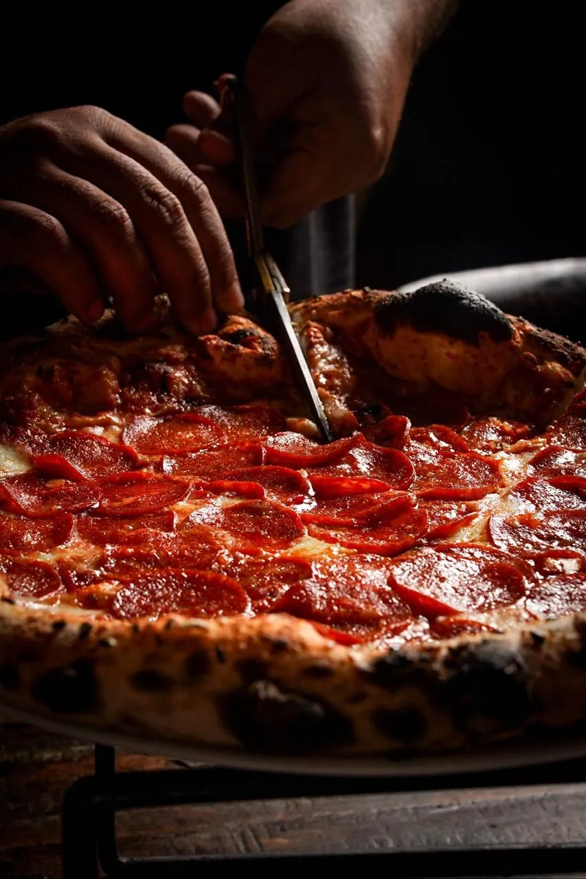 A picture of a Napolitean pizza with pepperoni in India