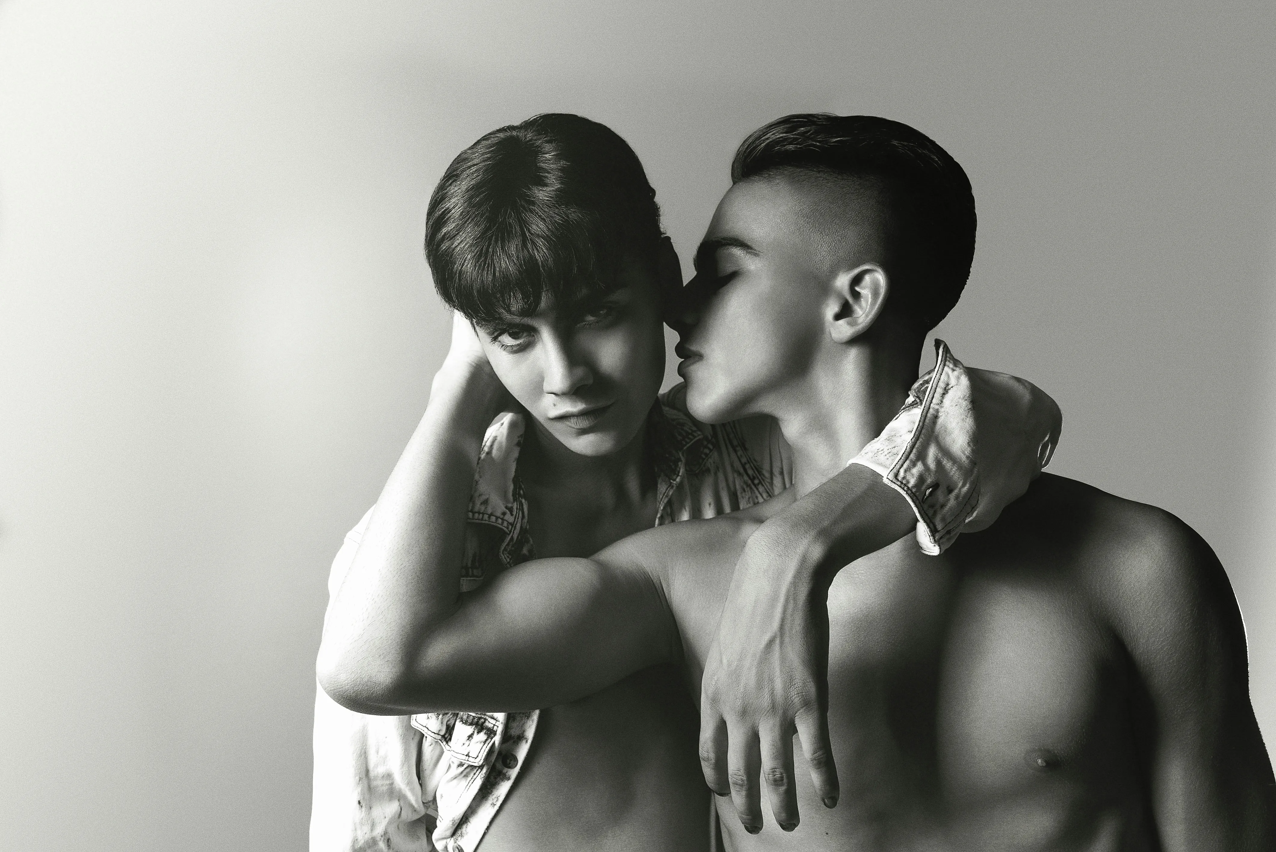 Two men pose intimately to depict queer masculinity in India, as week as redefining masculinity