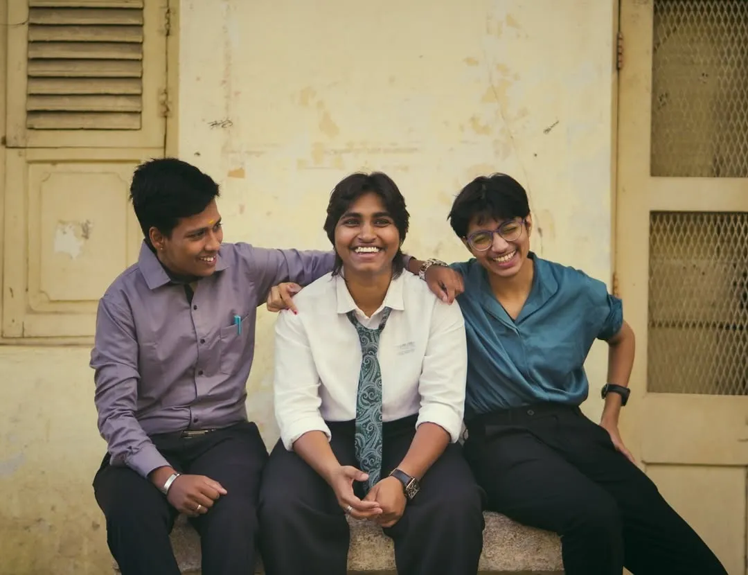 Three people depict queer representation wearing ties and shirts to show their transmasculine identity and redefining masculinity in India