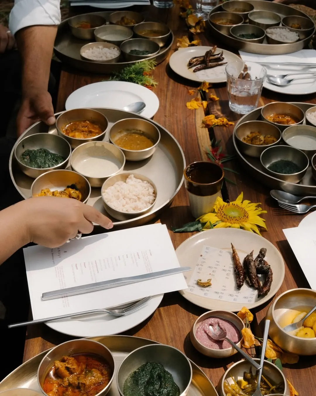 Plates of food at Amaya that incorporate local ingredients and flavours and also look like fine dining, making it fall into the categories of boutique hotels India as well as eco stay India, making it one of the popular eco hotels and resorts in India.