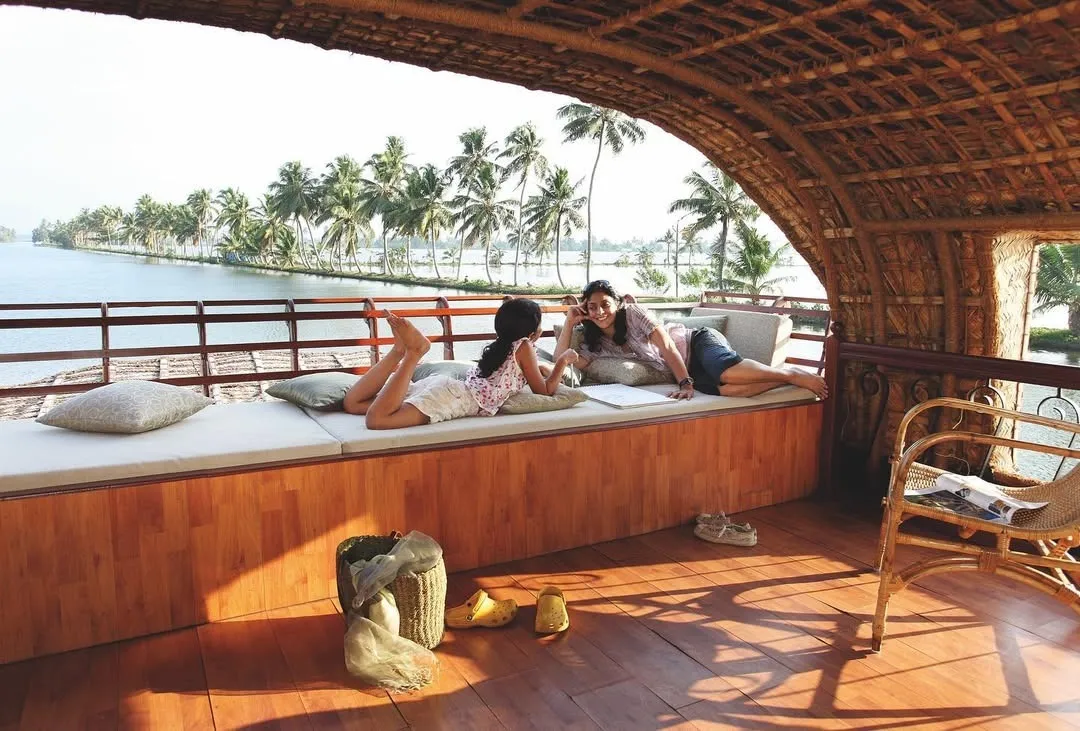 A houseboat by Xandari Resorts that works as a boutique hotels India as well as an eco stay India, showing the impact of eco tourism India.