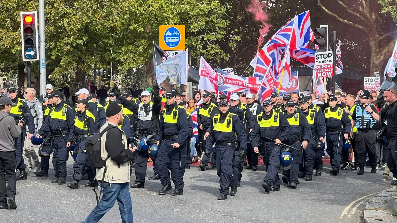 A picture of anti immigration-protests in the UK which is impacting migrant workers including Indian immigrants.