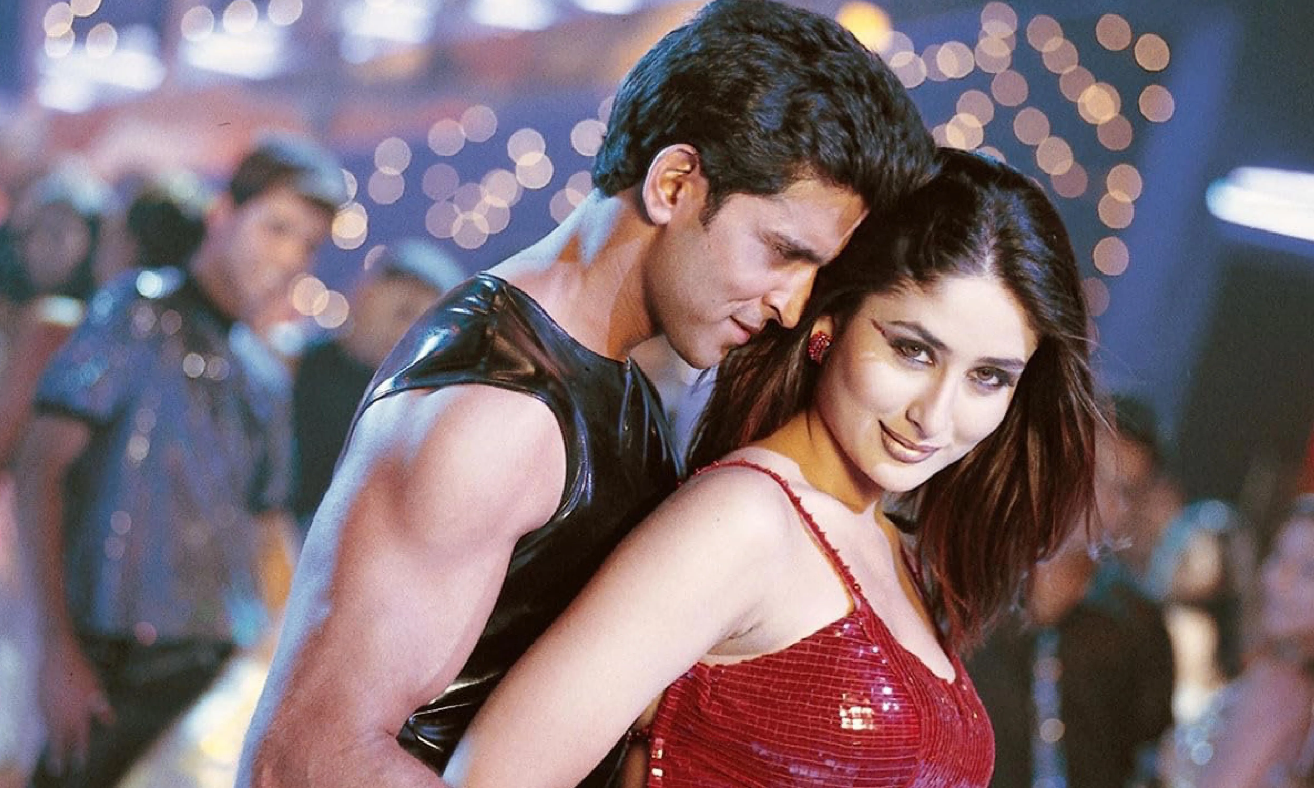 Kareena Kapoor Khan as Poo in Kabhi Khushi Kabhie Gham, with Hrithik Roshan in the iconic “You’re hot” dance sequence — defining early-2000s Bollywood glamour.