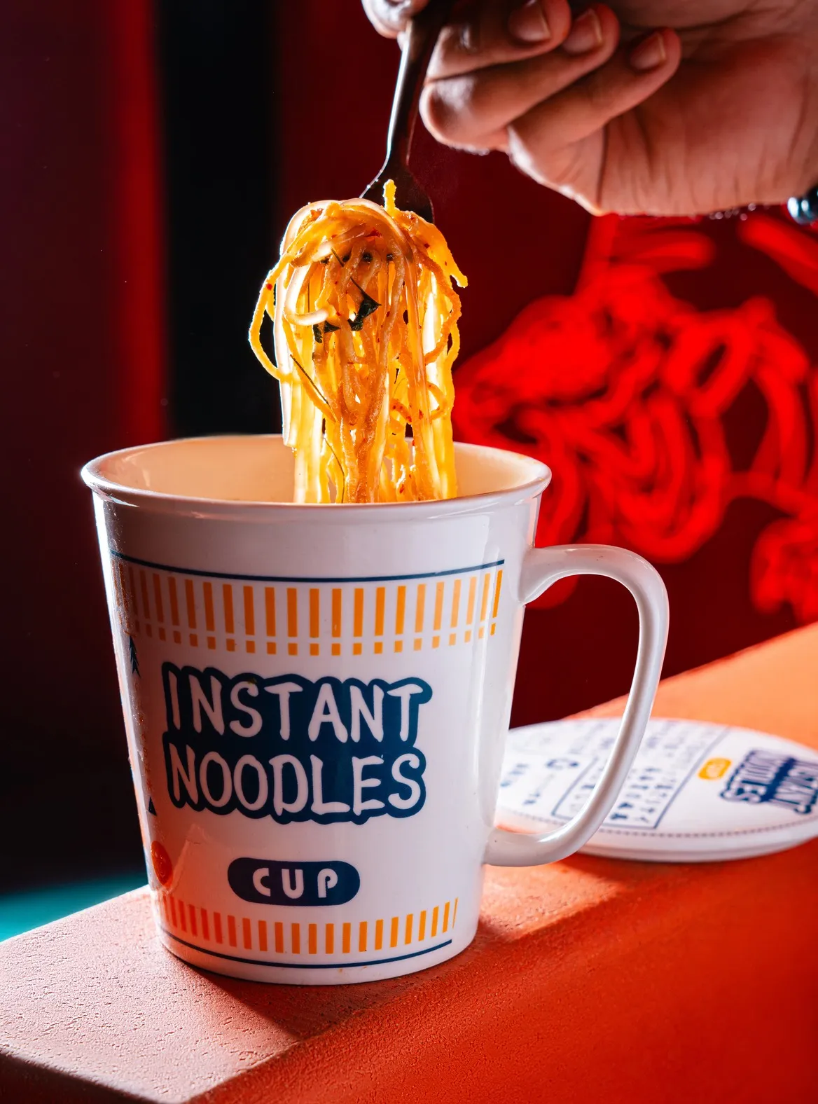 A picture of a cup of instant noodles, one of the crucial Asian food trends India which has made noodles popular in India, to show how Asian influence in India has spread