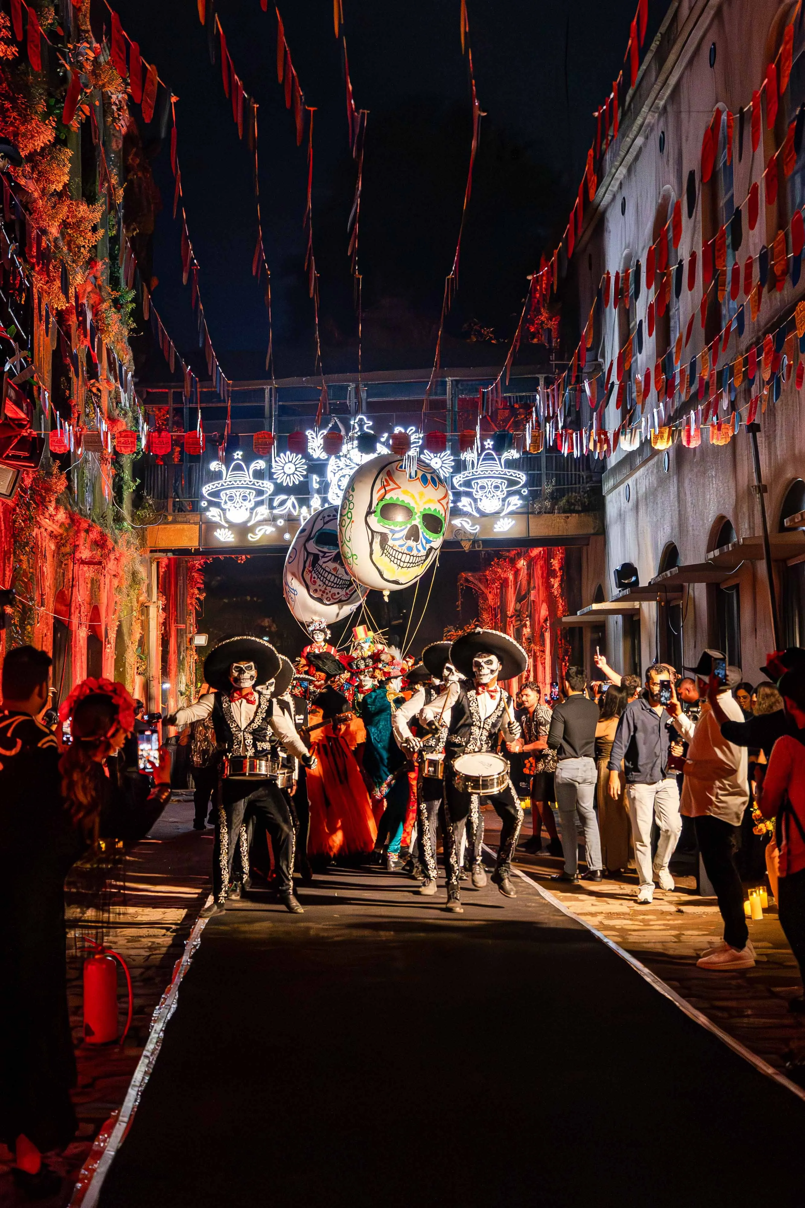 A picture of a street decorated for the day of the dead celebration via Mexican art in India which also establishes India and Mexico cultural connection