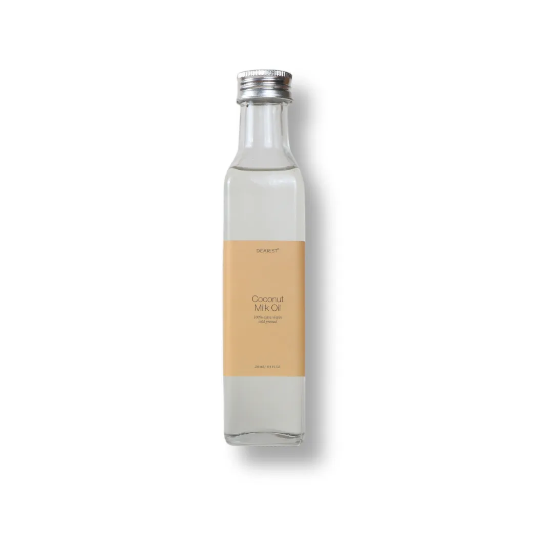 a bottle containing the best body oil derived from pure coconut milk oil
