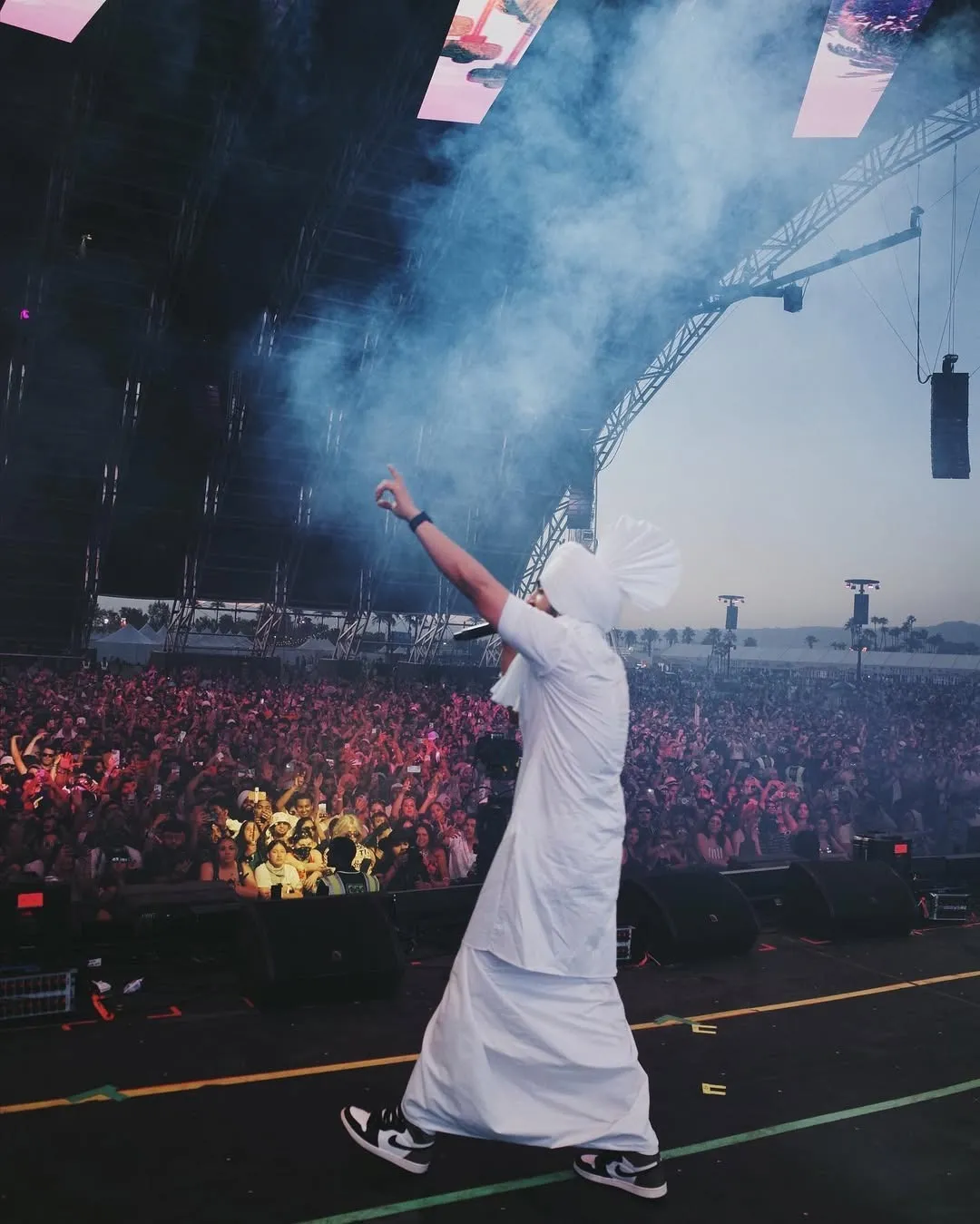 A picture of Diljit Dosanjh performing at Coachella Music Festival, showing how Indian pop music and independent music in India is going global